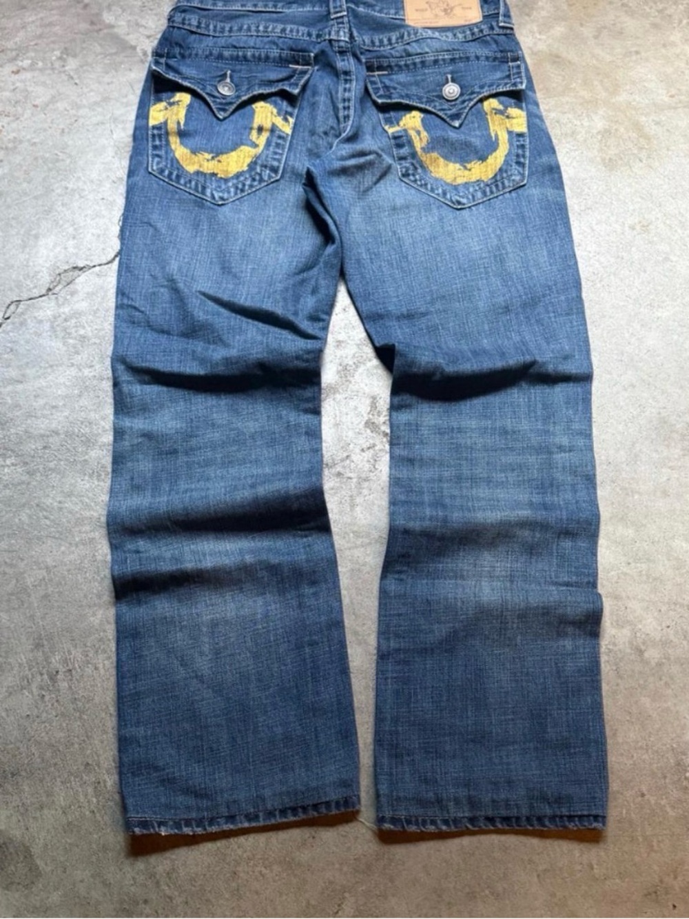 True Religion Straight-Leg Jeans with Yellow Back Pocket Design
